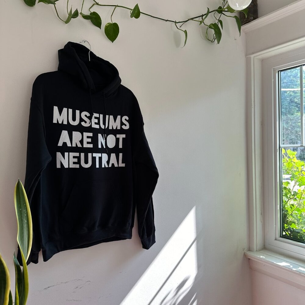 UNISEX "Museums are not neutral" black hoodie - Brand New - Custom Print